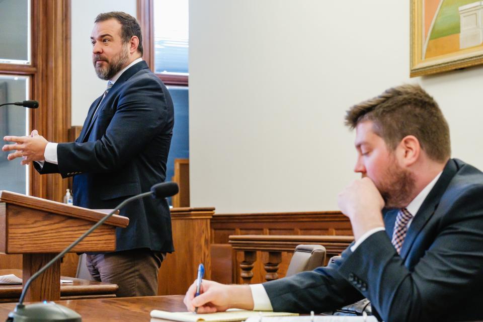 Timothy Rudd, left, an attorney representing Dover Chemical Corporation addresses the court as Halden R. Schwallie, representing the City of Dover, takes notes during a hearing in the ongoing lawsuit between the two parties, Monday, Aug. 14 in Tuscarawas County Court of common pleas.