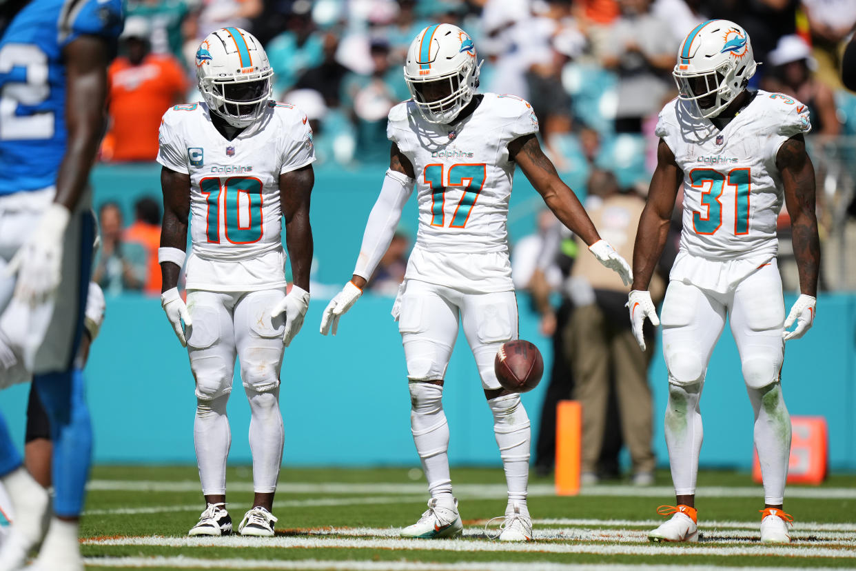 The Dolphins are a fantasy goldmine because they don't spread the ball around, instead Tyreek Hill #10, Jaylen Waddle #17 and Raheem Mostert #31 deservedly get the bulk of the touches. (Photo by Rich Storry/Getty Images)