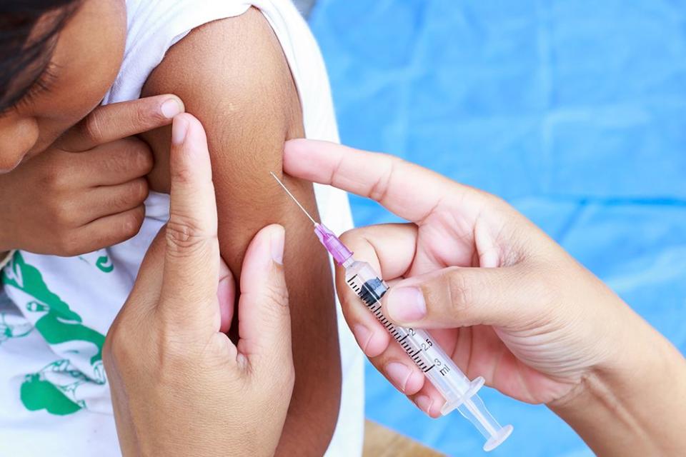 child getting a flu shot