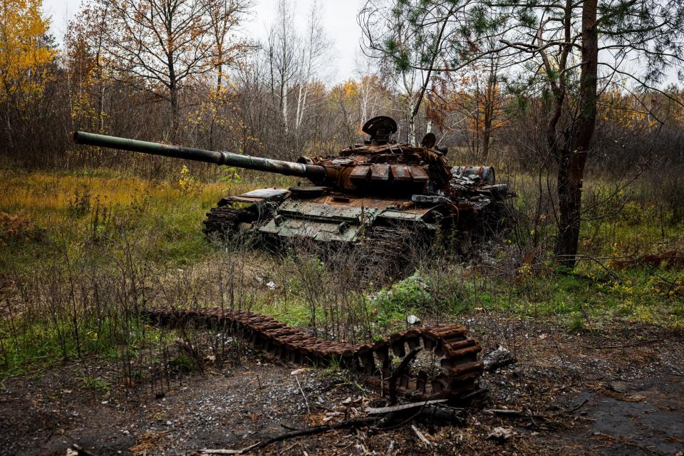 TOPSHOT - This photograph taken on November 1, 2022, shows a destroyed tank near the recently recaptured Ukrainian village of Yampil, eastern Ukraine, amid the Russian invasion of Ukraine. (Photo by Dimitar DILKOFF / AFP) (Photo by DIMITAR DILKOFF/AFP via Getty Images)