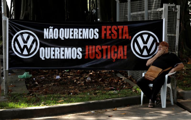 FILE PHOTO: Former Volkswagen worker Raimundo Nonato sits in front of VW factory headquarters in Sao Bernardo do Campo