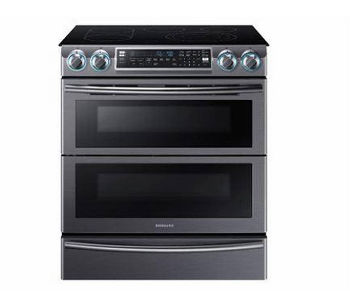 Samsung Electric Range, model No. NE58K9850WS/AA