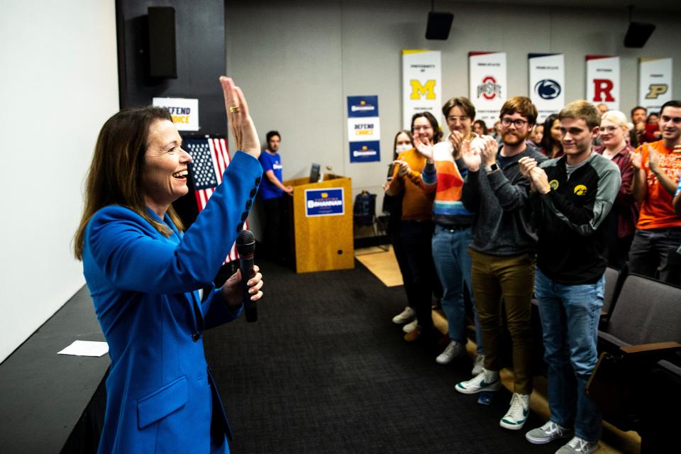 1st Congressional District candidate state Rep. Christina Bohannan, D-Iowa City, waves while being introduced during a "Get Out The Vote" rally with the University of Iowa Democrats, Wednesday, Oct. 19, 2022, at the Iowa Memorial Union in Iowa City, Iowa.
