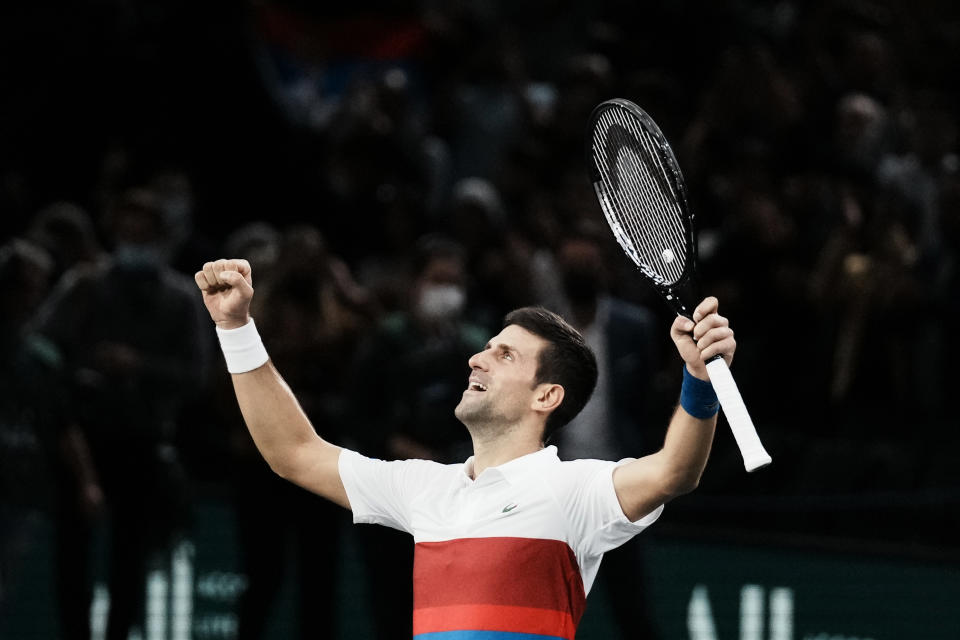 Serbia's Novak Djokovic celebrates defeating Russia's Daniil Medvedev during the final match of the Paris Masters tennis tournament at the Accor Arena in Paris, Sunday, Nov.7, 2021. Djokovic won 4-6, 6-3, 6-3. (AP Photo/Thibault Camus)