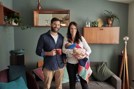 New Zealand Prime Minister Jacinda Ardern, carrying her newborn baby Neve Te Aroha Ardern Gayford, poses with her partner Clarke Gayford for a photo, in New Zealand, August 1, 2018. Derek Henderson/New Zealand Prime Minister’s Office/Handout via REUTERS