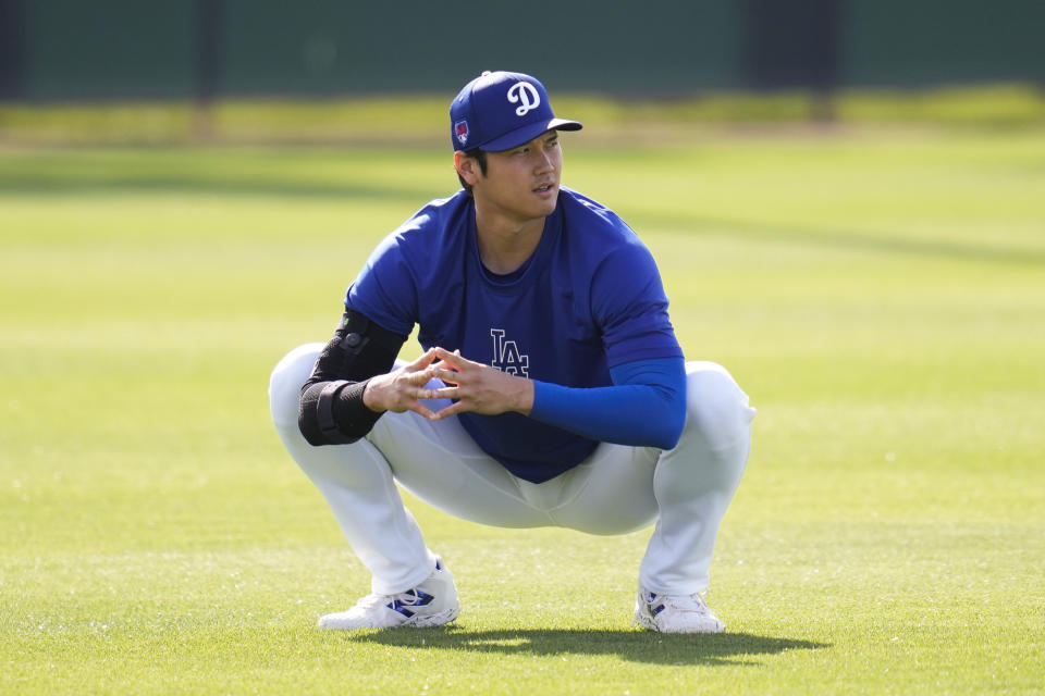 Los Angeles Dodgers designated hitter Shohei Ohtani participates in spring training baseball workouts at Camelback Ranch in Los Angeles, Sunday, Feb. 25, 2024. (AP Photo/Ashley Landis)