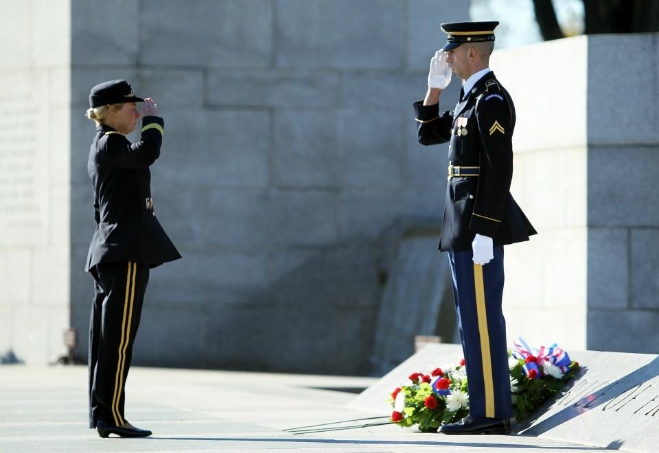 Female Veterans Lay Wreath At World War II Memorial In Washington