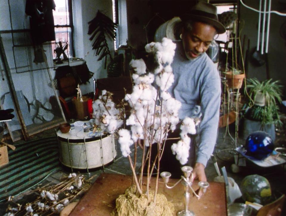 Artist David Hammons, shown in his Harlem studio in the 1980s, is the subject of "The Melt Goes on Forever: The Art and Times of David Hammons," showing Friday and Saturday at the Wexner Center for the Arts.