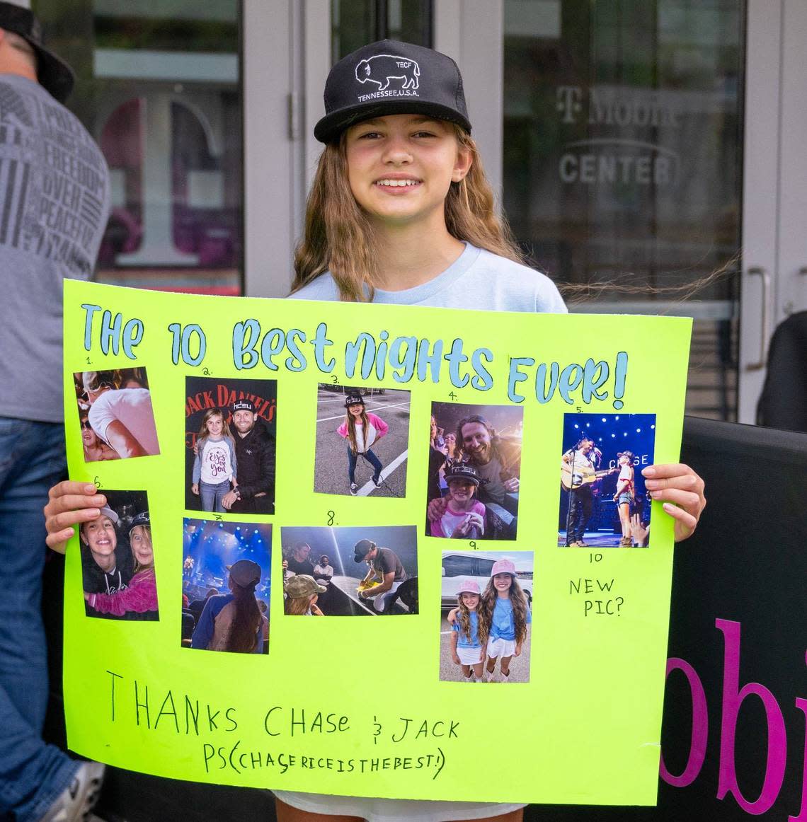 Eleven-year-old Alice Carver holds up a sign celebrating Chase Rice while waiting in line for the Dierks Bentley concert Friday at T-Mobile Center.