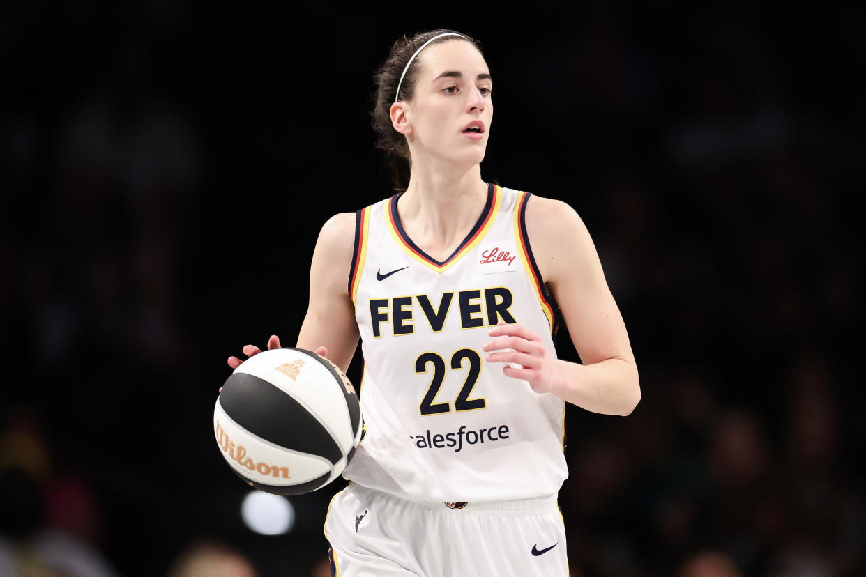 NEW YORK, NEW YORK - JUNE 02: Caitlin Clark #22 of the Indiana Fever dribbles the ball against the New York Liberty during the second half at Barclays Center on June 02, 2024 in New York City. (Photo by Luke Hales/Getty Images)