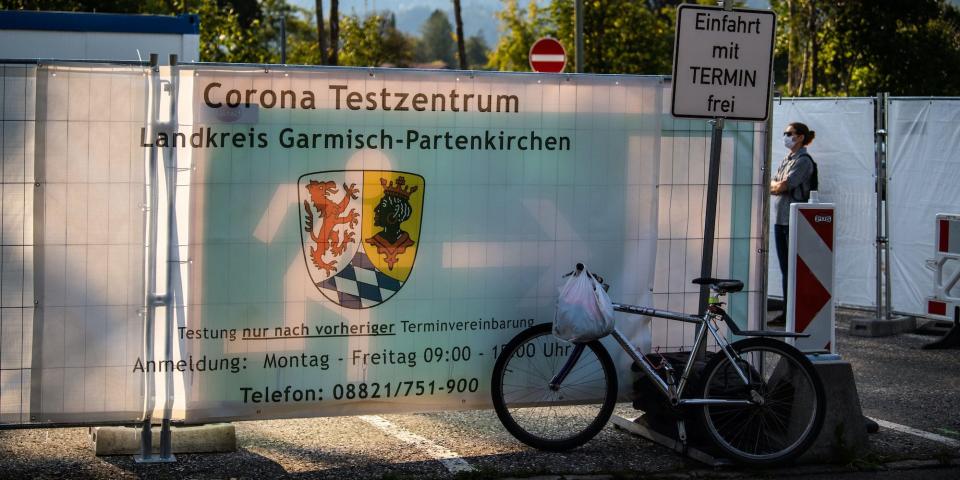 13 September 2020, Bavaria, Garmisch-Partenkirchen: One person is standing in front of the Corona test centre of the city. After a violent corona outbreak in Garmisch-Partenkirchen, Upper Bavaria, it is still unclear what consequences the suspected culprit must expect. The authorities assume that the outbreak was caused by a so-called superspreader. Photo: Lino Mirgeler/dpa (Photo by Lino Mirgeler/picture alliance via Getty Images)