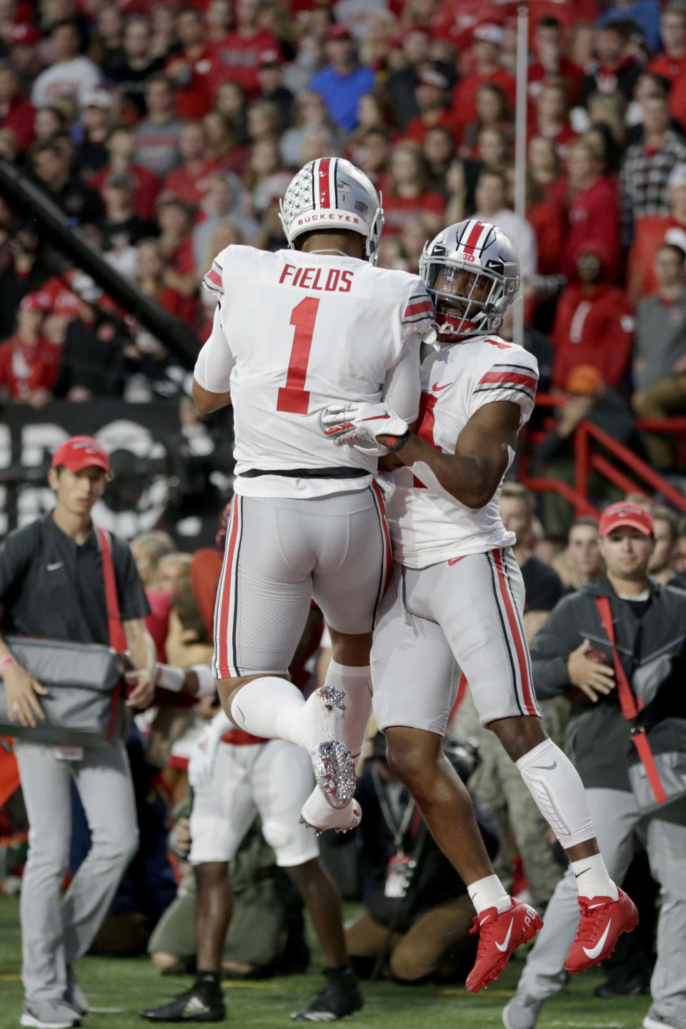 Ohio State wide receiver K.J. Hill, right, celebrates his touchdown with quarterback Justin Fields (1) during the first half of an NCAA college football game against Nebraska in Lincoln, Neb., Saturday, Sept. 28, 2019. (AP Photo/Nati Harnik)