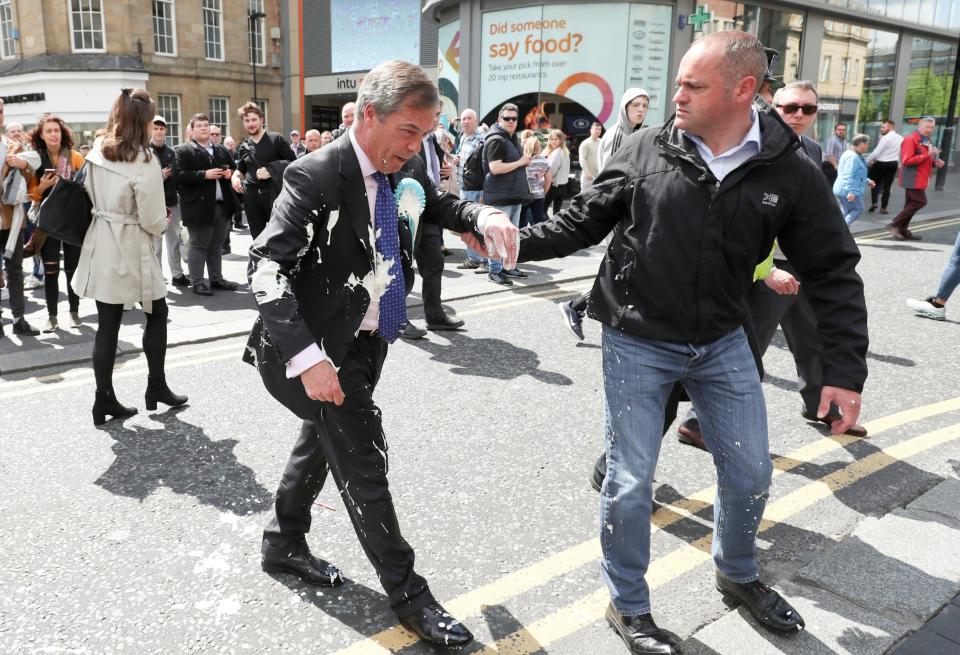 Nigel Farage ‘becomes trapped on Brexit Party bus as he is targeted by people holding milkshakes’