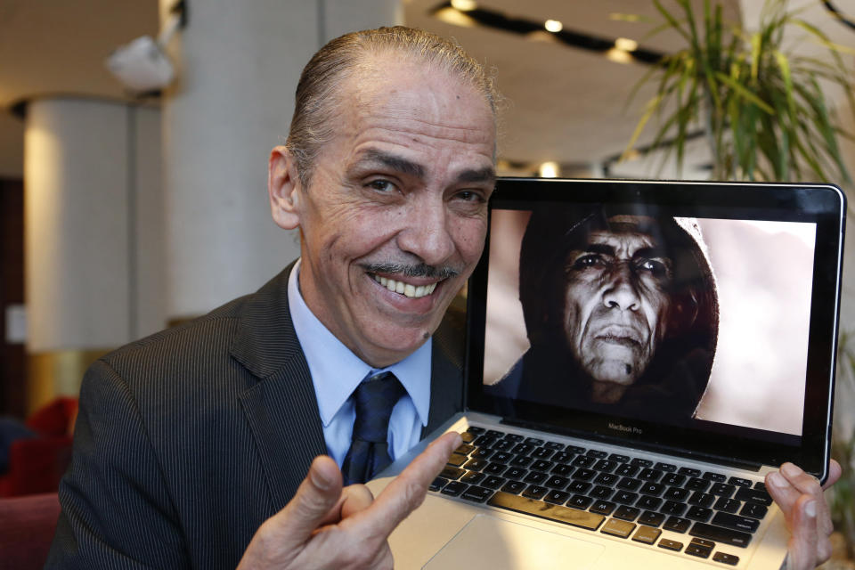 Moroccan actor Mehdi Ouazzani poses with a frame from his role during an interview with the Associated Press in Casablanca, Morocco Monday, April, 1, 2013. Ouazzani isn’t the devil, but he has played one on TV, only he didn’t realize that some thought he looked like US President Barack Obama while he was at it. Ouazzani was bemused to wake up one morning and find that his role in The History Channel’s popular five-part mini-series “The Bible” had become the latest way for conservative commentators in the United States to needle the president. (AP Photo/Abdeljalil Bounhar)