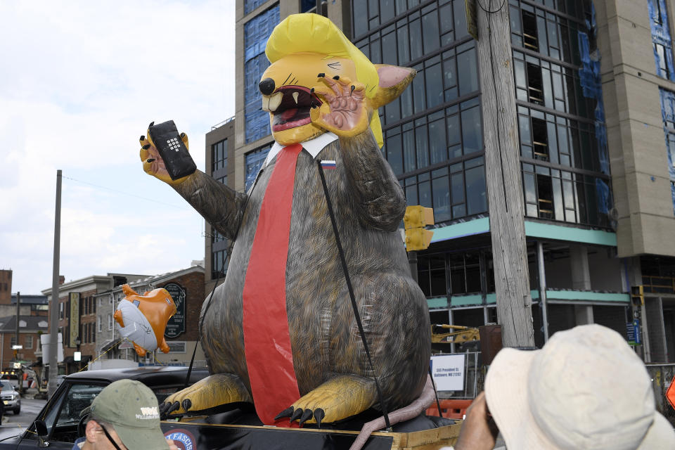 An giant inflatable rat depicting President Donald Trump is seen on the street near the U.S. House Republican Member Retreat, Thursday, Sept. 12, 2019, in Baltimore. (AP Photo/Nick Wass)