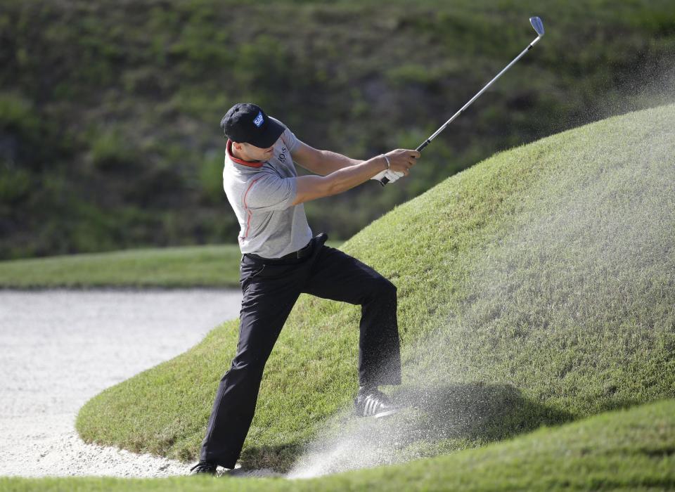 Martin Kaymer of Germany, hits from a sixth hole bunker during the second round of The Players championship golf tournament at TPC Sawgrass, Friday, May 9, 2014 in Ponte Vedra Beach, Fla. (AP Photo/Lynne Sladky)