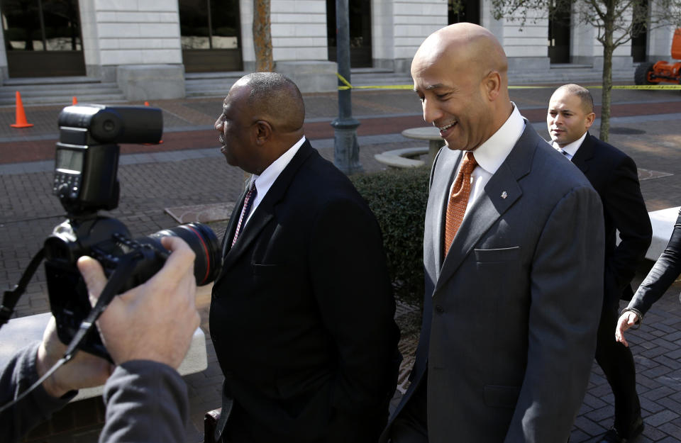 Former New Orleans Mayor Ray Nagin enters Federal Court in for jury selection and possible opening arguments for his corruption trial in New Orleans, Thursday, Jan. 30, 2014. Nagin is charged with accepting bribes, free trips and other gratuities from contractors in exchange for helping them secure millions of dollars in city work. The charges in his 21-count indictment, including bribery and wire fraud, are the product of a City Hall investigation that already has resulted in several convictions or guilty pleas by former Nagin associates. (AP Photo/Gerald Herbert)