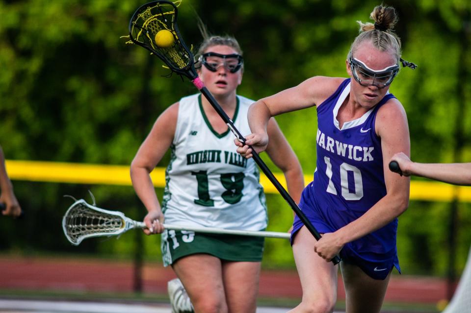 Warwick's Kiera Larney drives down field during the Section 9 Class b girls lacrosse game at O'Neill High School in Highland Falls, NY on Wednesday, May 25, 2022. Warwick defeated Minisink 12-10. KELLY MARSH/FOR THE TIMES HERALD-RECORD