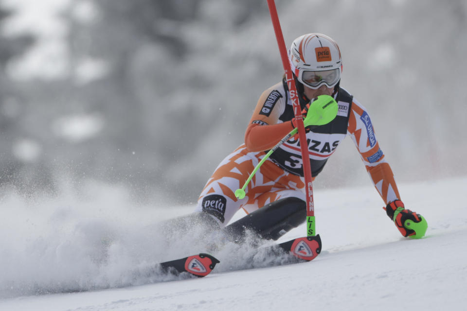 Slovakia's Petra Vlhova speeds down the course during an alpine ski, women's World Cup slalom, in Spindleruv Mlyn, Czech Republic, Saturday, Jan. 28, 2023. (AP Photo/Giovanni Maria Pizzato)
