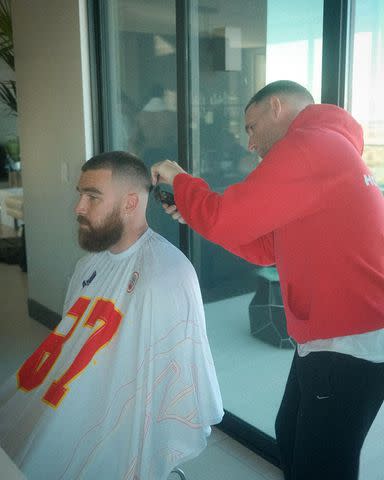 <p>Patrick Regan/Instagram</p> Travis Kelce gets his haircut before the 2024 Super Bowl by his barber Patrick Regan