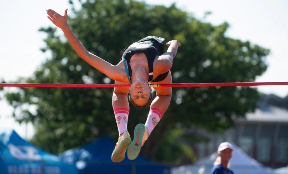 Emerald Ridge’s JaiCieonna Gero-Holt clears the bar en route to a state title in the 4A girls high jump during the second day of the WIAA state track and field championships at Mount Tahoma High School in Tacoma, Washington, on Friday, May 26, 2023. Gero-Holt followed up the high jump victory with a state championship in the 4A girls 100-meter hurdles, her third state title of the weekend so far.