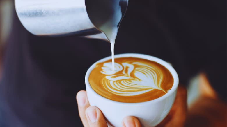 barista making latte art
