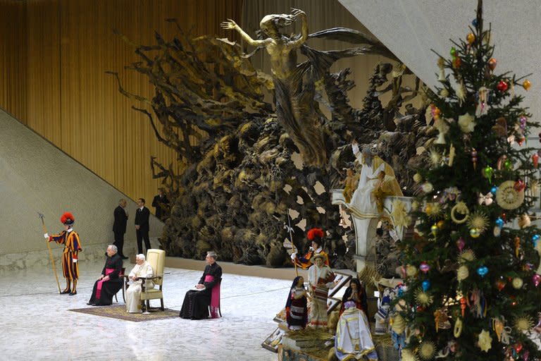 Pope Benedict XVI during his weekly general audience on December 12, 2012 at the Paul VI hall at the Vatican. The pope signed a decree on Thursday recognising the "heroic virtues" of late pope Paul VI, putting him on the first step towards beatification and eventual sainthood