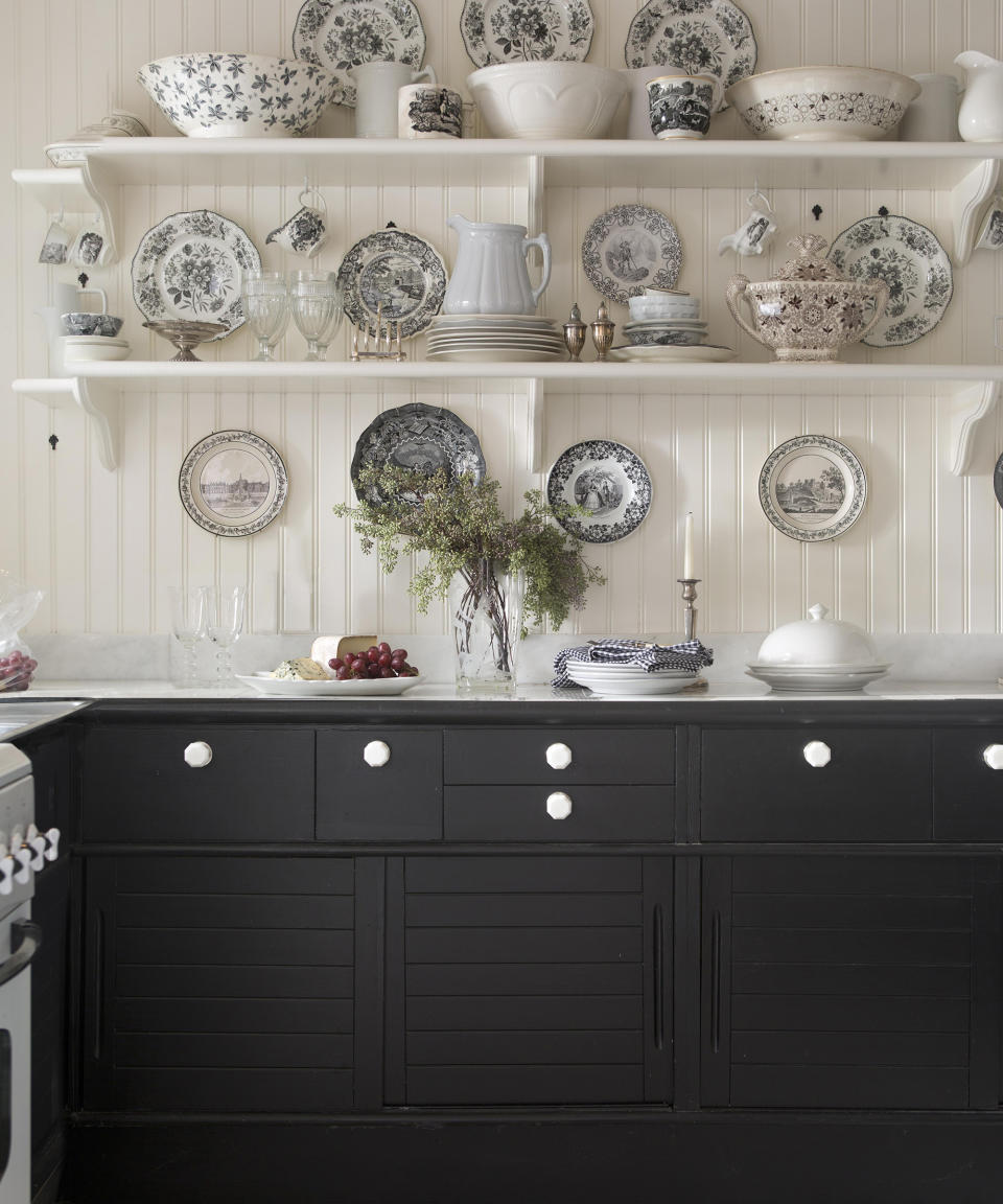 <p> Echoing the style of a classic country dresser, open shelving is the perfect way to showcase collections of china and other precious heirlooms and treasures.  </p> <p> Make the display stand out using a backdrop of tongue and groove panelling in pure white and contrast with dramatic black cabinetry.  </p>