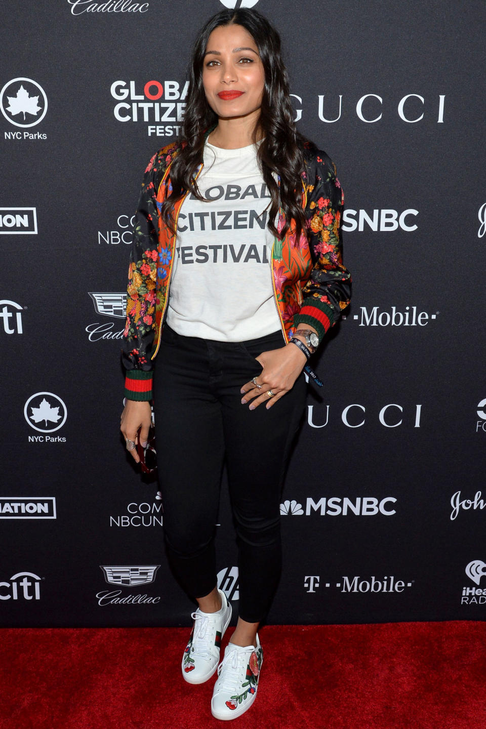 <p><strong>23 September</strong> Frieda Pinto kept it casual wearing a Gucci bomber jacket and trainers with the festival's own logo top.</p>