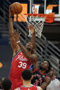 Philadelphia 76ers center Dwight Howard (39) shoots over Toronto Raptors forward OG Anunoby (3) during the first half of an NBA basketball game Sunday, Feb. 21, 2021, in Tampa, Fla. (AP Photo/Chris O'Meara)