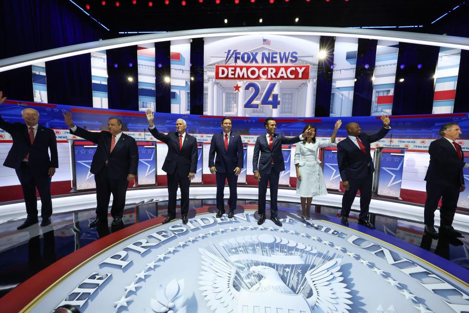 August 23, 2023: Republican presidential candidates (L-R), former Arkansas Gov. Asa Hutchinson, former New Jersey Gov. Chris Christie, former U.S. Vice President Mike Pence, Florida Gov. Ron DeSantis, Vivek Ramaswamy, former U.N. Ambassador Nikki Haley, U.S. Sen. Tim Scott (R-SC) and North Dakota governor Doug Burgum, are introduced during the first debate of the GOP primary season hosted by FOX News at the Fiserv Forum in Milwaukee, Wisconsin. The 8 presidential hopefuls squared off in the first Republican debate as former U.S. President Donald Trump, currently facing indictments in four locations, declined to participate in the event.