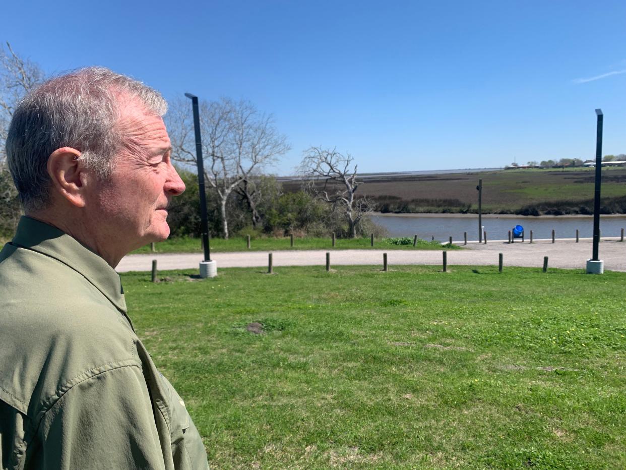 Gary Ralston, a member of the Calhoun County Historical Commission, looks out over the grounds of the Battle of Norris Bridge, an 1863 skirmish between the Union Army and Texas Rangers on the banks of Chocolate Bayou.
