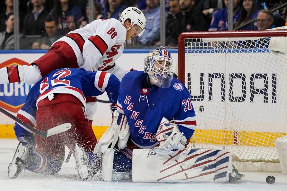 Carolina Hurricanes left wing Teuvo Teravainen (86) scores on New York Rangers goaltender Igor Shesterkin (31) during the second period of an NHL hockey game, Tuesday, April 26, 2022, in New York. (AP Photo/John Minchillo)