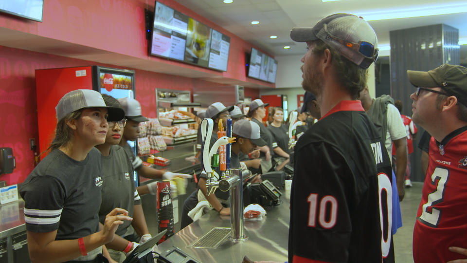 Fans order food at Mercedes-Benz Stadium before an Aug. 31, 2017 Atlanta Falcons preseason game.