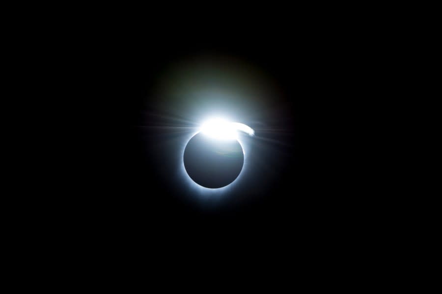 The diamond-ring effect occurred at the beginning and end of totality during a total solar eclipse. As the last bits of sunlight pass through the valleys on the moon’s limb, and the faint corona around the sun is just becoming visible, it looks like a ring with glittering diamonds on it. Credit: (NASA/Carla Thomas)