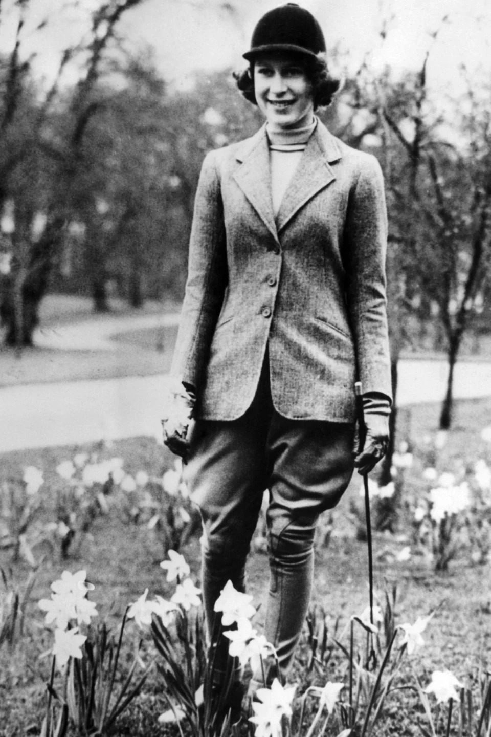 April 21, 1940: Elizabeth picking daffodils on her 14th birthday in Windsor Park (CSU Archives/Everett Collection/Rex)