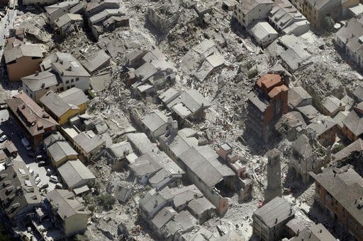 Aerial view of Amatrice in central Italy, Wednesday, Aug. 24, 2016, as it appears after a magnitude 6 quake struck at 3:36 a.m. (0136 GMT) and was felt across a broad swath of central Italy, including Rome where residents of the capital felt a long swaying followed by aftershocks. (AP Photo/Gregorio Borgia)