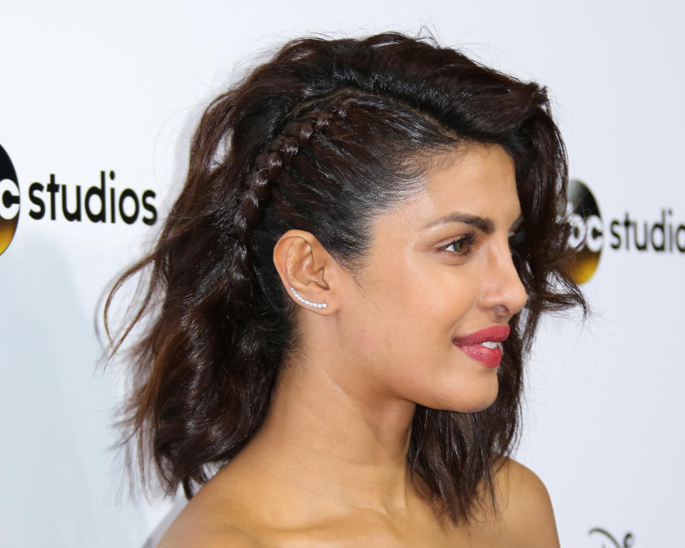 Priyanka Chopra </br> <em>A faux undercut created with a taunt French braid is a simple way to revive second-day beachy waves. </em>