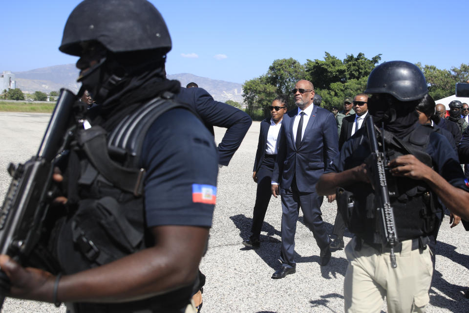 Haitian Prime Minister Ariel Henry leaves after attending a graduation ceremony for new members of the country's armed forces in Port-au-Prince, Haiti, Thursday, Dec. 22, 2022. (AP Photo/Odelyn Joseph)