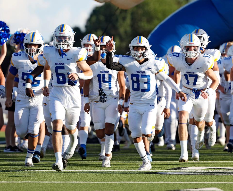 Frenship players run onto the field before a football game against Lubbock-Cooper, Friday, Sept. 2, 2022, at Pirate Stadium at First United Park. 