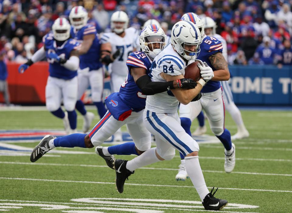 Colts tight end Jack Doyle is tackled by Bills cornerback Levi Wallace. 