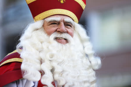 Saint Nickolas attends a traditional parade in Amsterdam, Netherlands, November 18, 2018. REUTERS/Eva Plevier