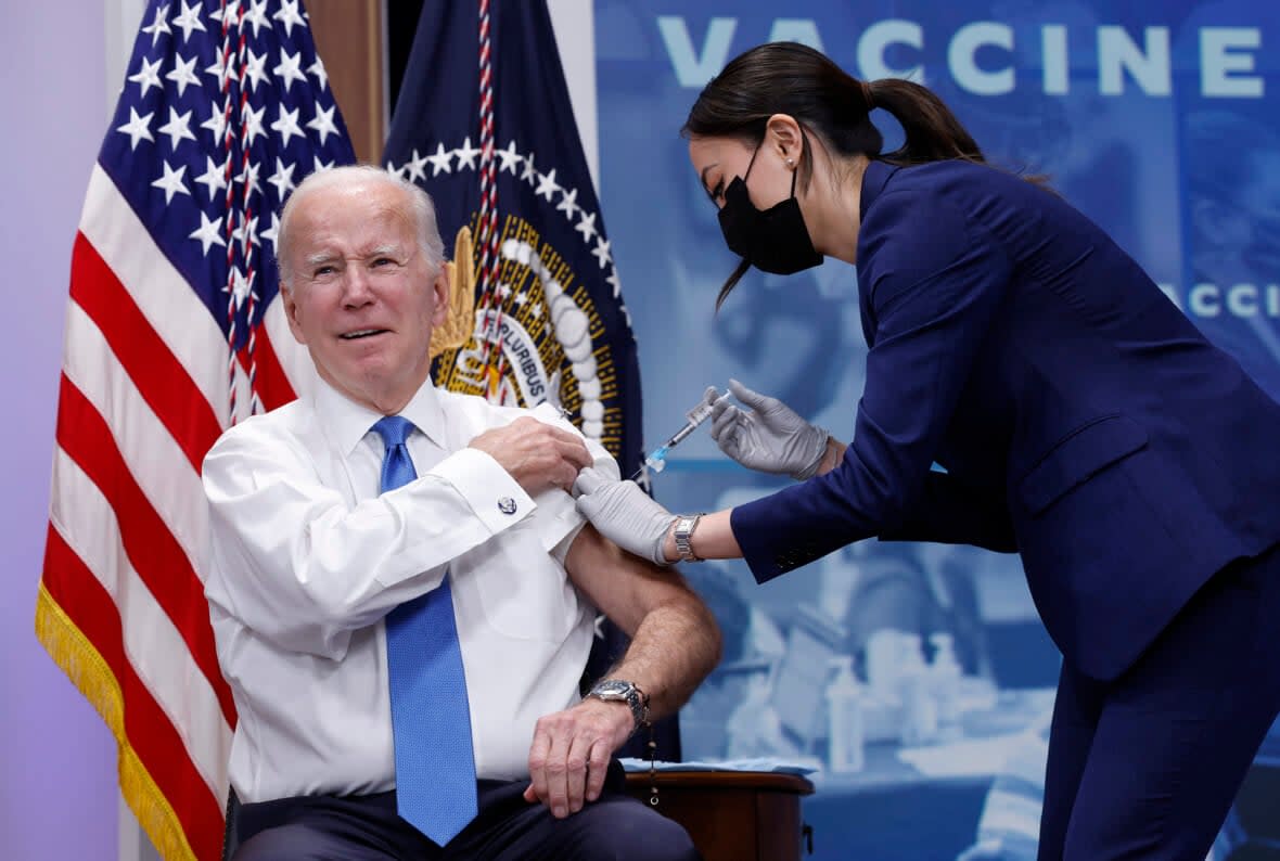 President Joe Biden receives his updated COVID-19 booster on Oct. 25, 2022 in the South Court Auditorium at the White House in Washington, D.C. (Photo by Anna Moneymaker/Getty Images)