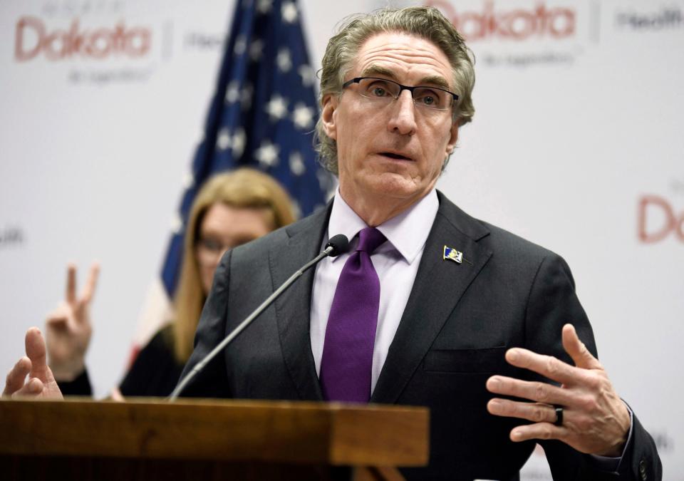 FILE - North Dakota Gov. Doug Burgum speaks at the state Capitol on April 10, 2020, in Bismarck, N.D. Teachers in North Dakota can still refer to transgender students by the personal pronouns they use, after lawmakers on Monday, April 3, 2023, failed to override the governor’s veto of a controversial bill to place restrictions on educators.