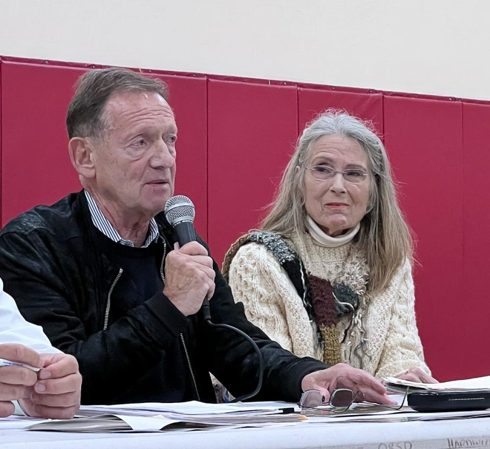 Richard Fields and Robin Kalaidjian, managing partners in Commonwealth Equine and Agricultural Center, at a public hearing on their proposed thoroughbred horse breeding, racing and retirement facility on Oct. 3 in Hardwick.