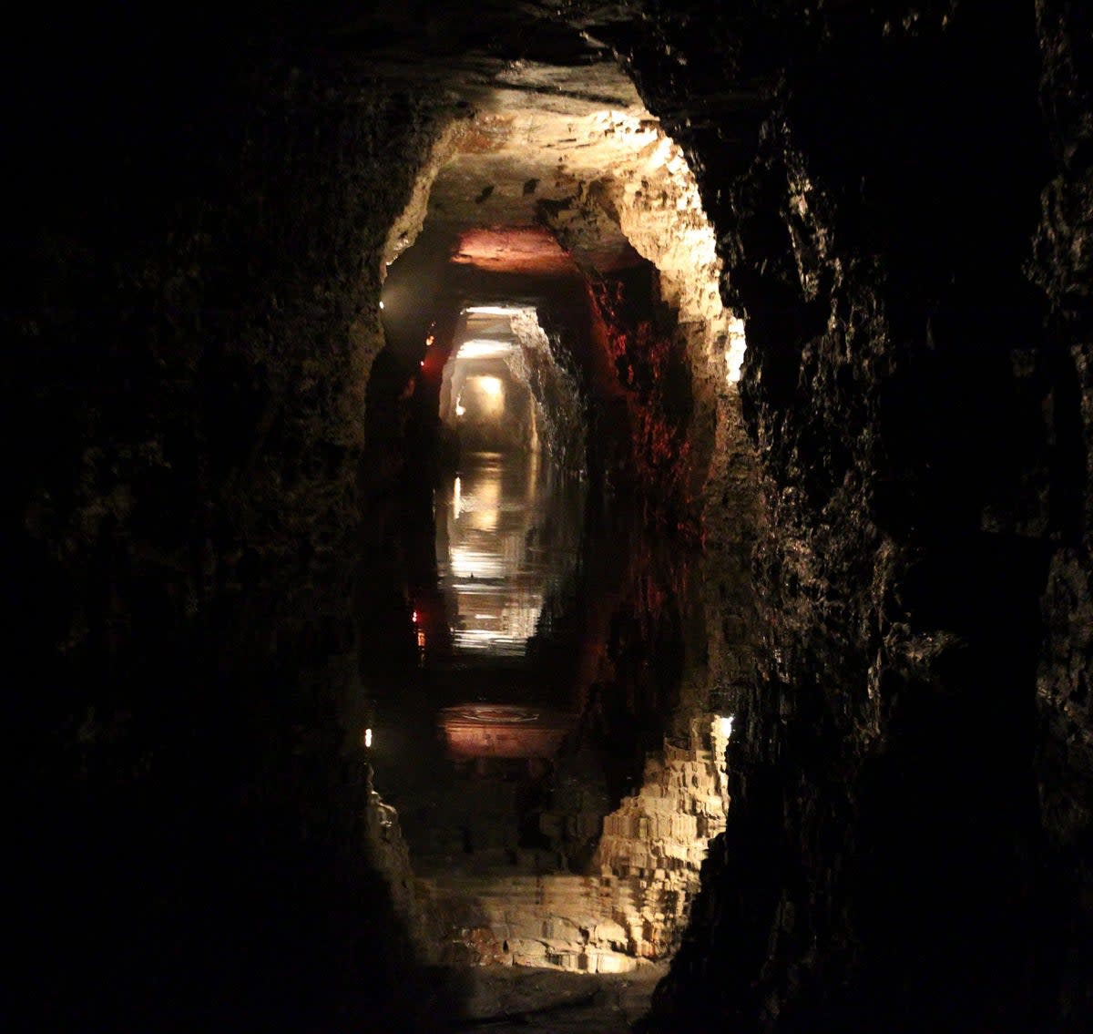 FILE - Water reflects the rock of the man-made Lockport Caves in Lockport, N.Y., on Aug. 21, 2014 (2014, BUFFALO NEWS)