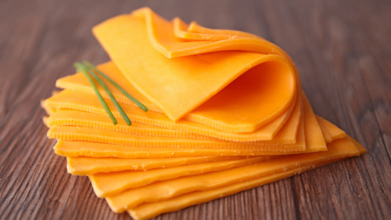 Slices of yellow cheese