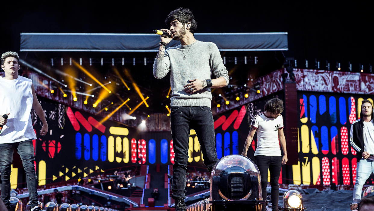 Anglo-Irish pop boy band One Direction perform during their 'Where We Are Tour 2014' at Parken Stadium in Copenhagen, Denmark .