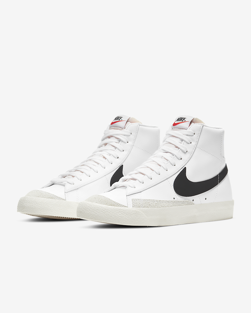 White high top shoes with black Swoosh