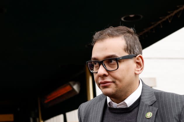 Rep. George Santos (R-N.Y.) leaves a GOP caucus meeting on Capitol Hill on Jan. 25.